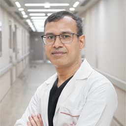 Dr Ashish Chakravarty